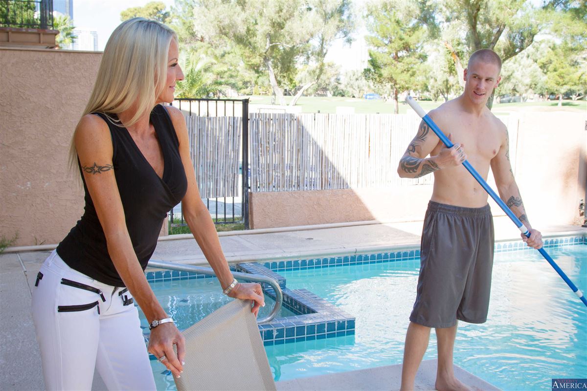 Shaved Mature Blonde MILF Emma Starr with Fake Tits Wearing Platform High Heels